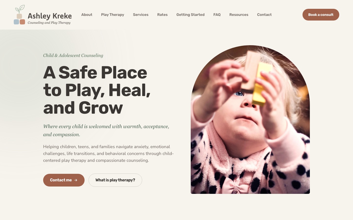 Ashley Kreke Counseling homepage: 'A Safe Place to Play, Heal, and Grow' beside a photo of a child playing with blocks